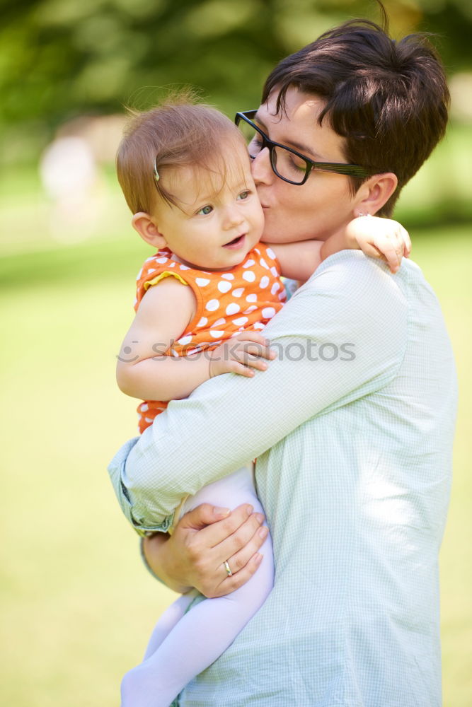 Happy lesbian couple with child