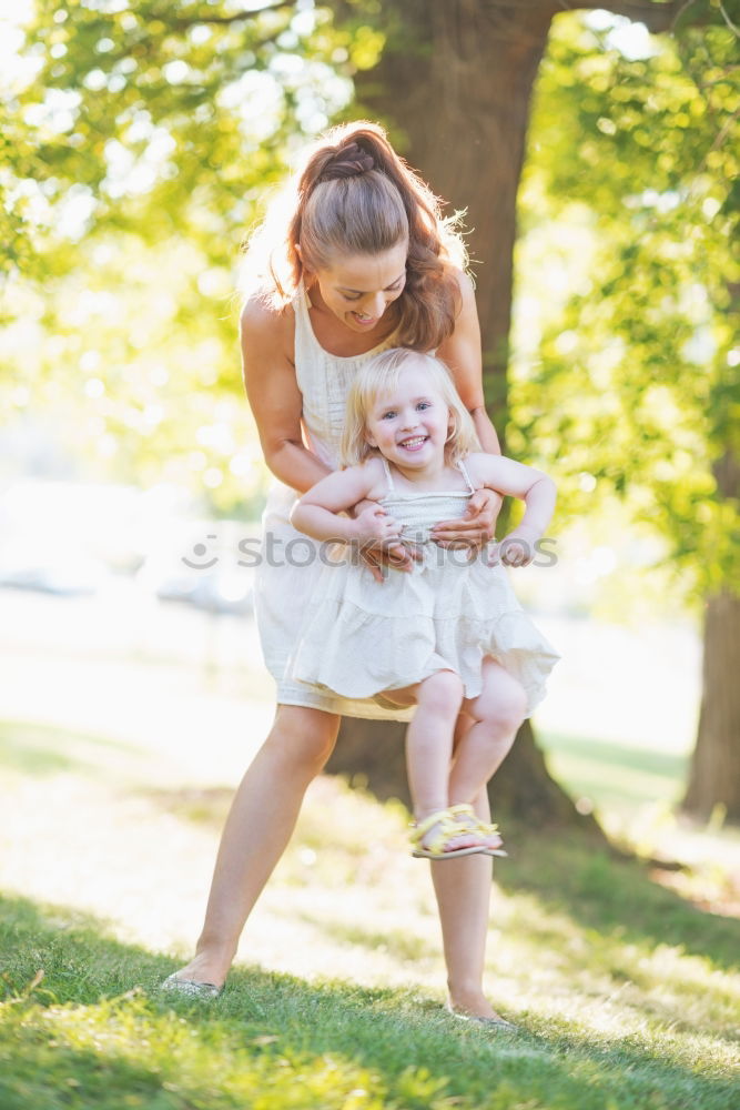 Similar – young beautiful woman having fun with her dog outdoors