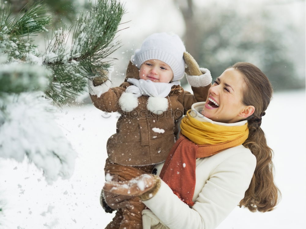 Similar – mother and baby on winter walk