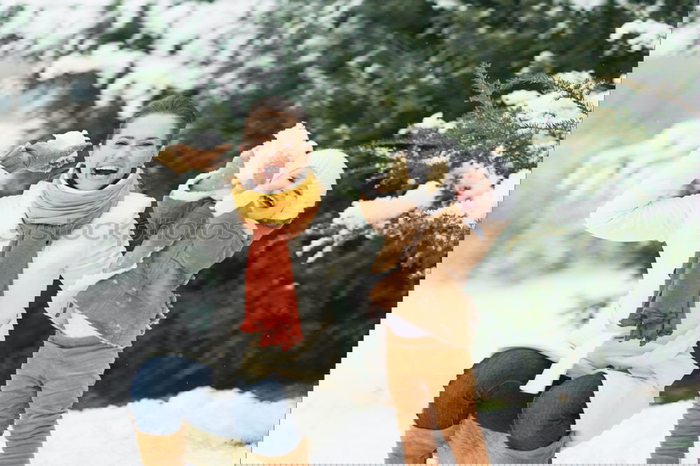 Similar – Image, Stock Photo Friends playing snowballs in woods