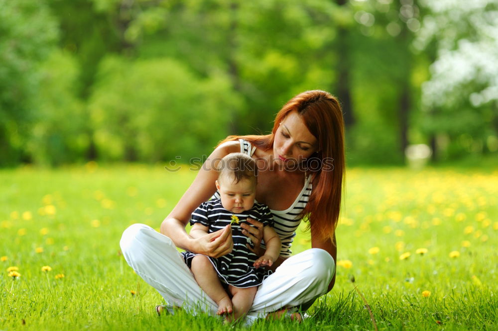 Similar – mother and little girl playing in the park