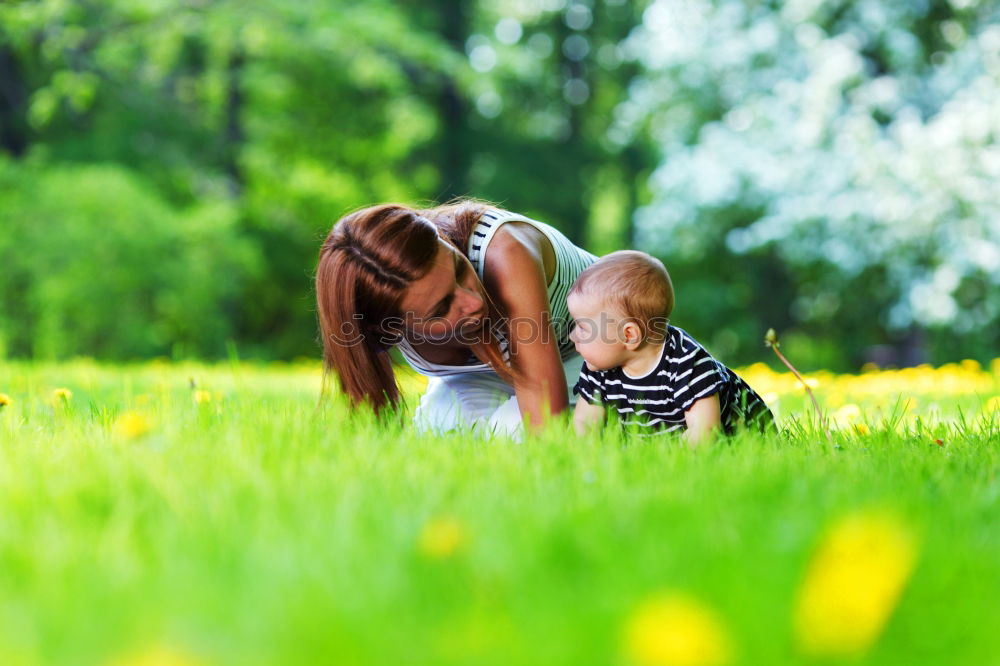 Similar – mother and little girl playing in the park