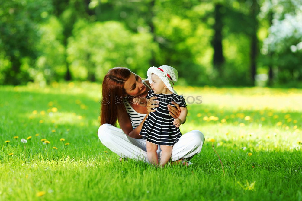 Similar – mother and little girl playing in the park