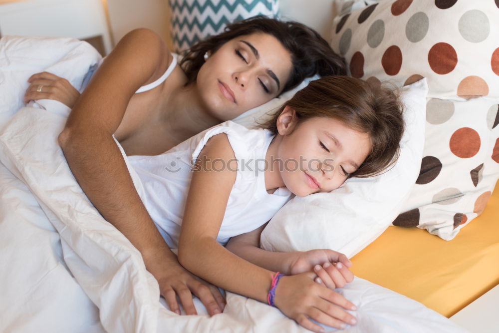 Similar – Image, Stock Photo mother and child son sleeping together in bed