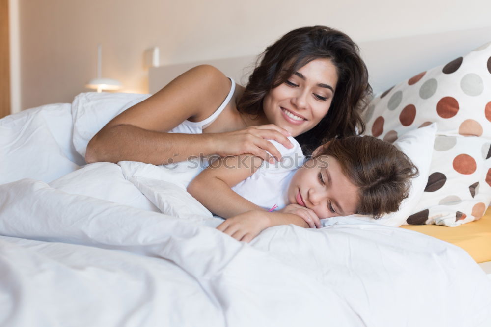 Similar – Image, Stock Photo mother and child son sleeping together in bed