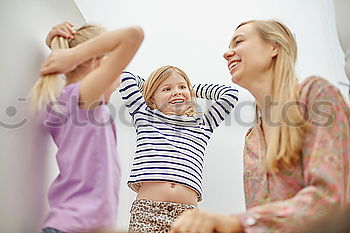 Similar – Image, Stock Photo happy toddler girl playing with mother