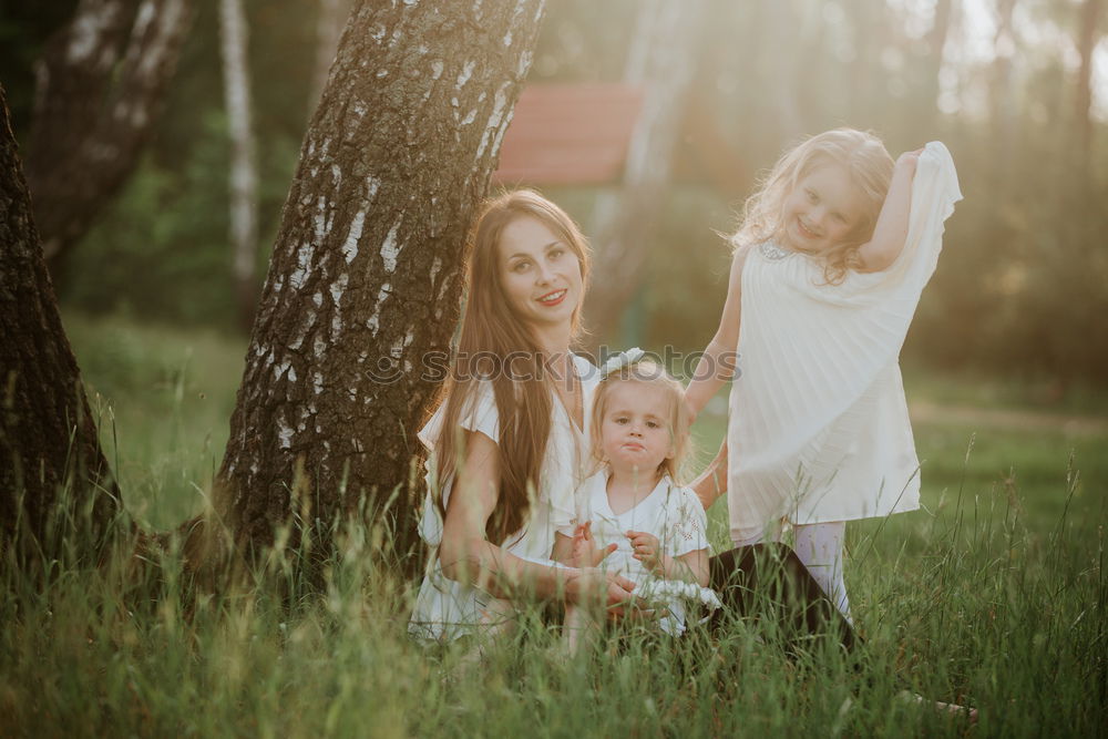 Image, Stock Photo Happy lesbian couple with child