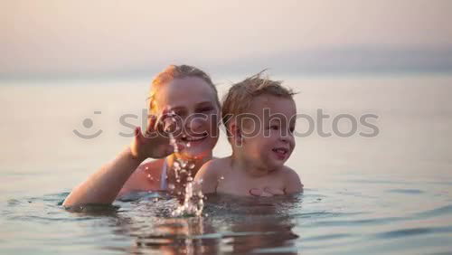 Similar – Image, Stock Photo Grandma and grandpa with grandchildren by the sea