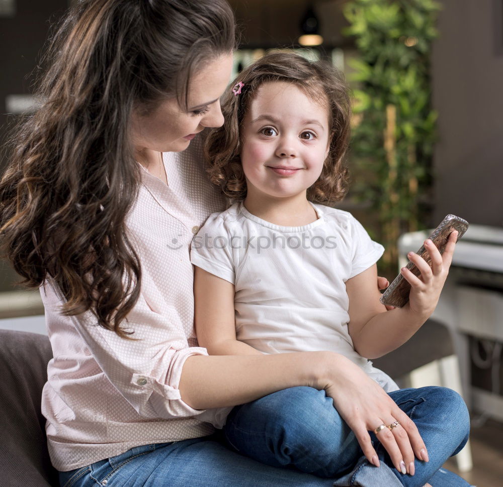 indoor portrait of happy mother and child son