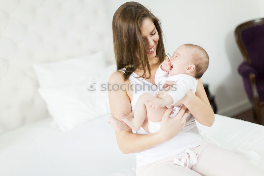 cute happy child girl relaxing at home on the bed