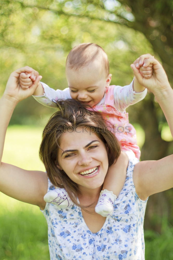 Similar – Image, Stock Photo Mom playing with her little daughter in the garden