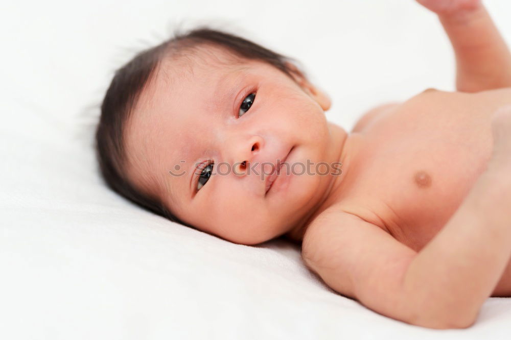 Similar – Image, Stock Photo newborn baby experiencing the world