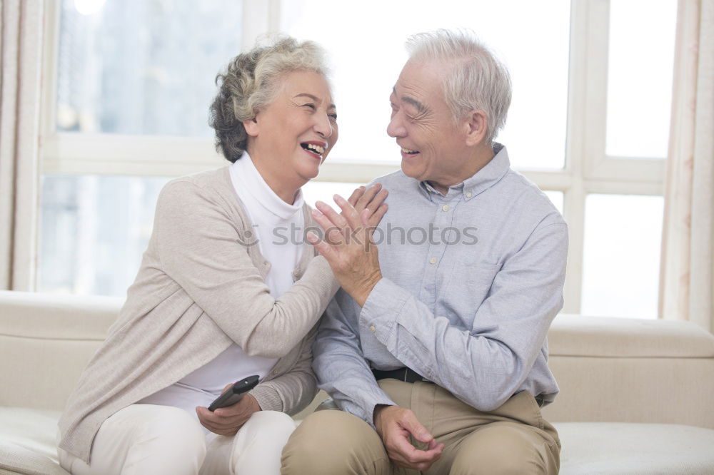 Similar – young man and old woman talking during a walk