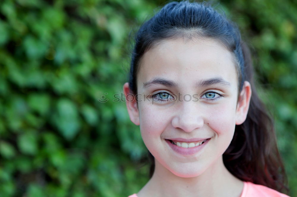 Similar – Happy preteen girl with blue eyes smiling