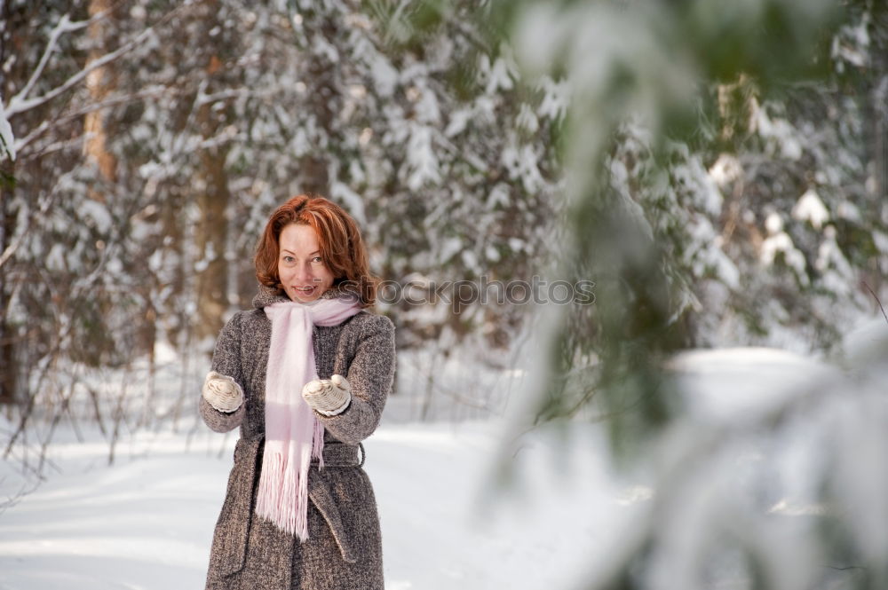 Young woman sleeping in the snow