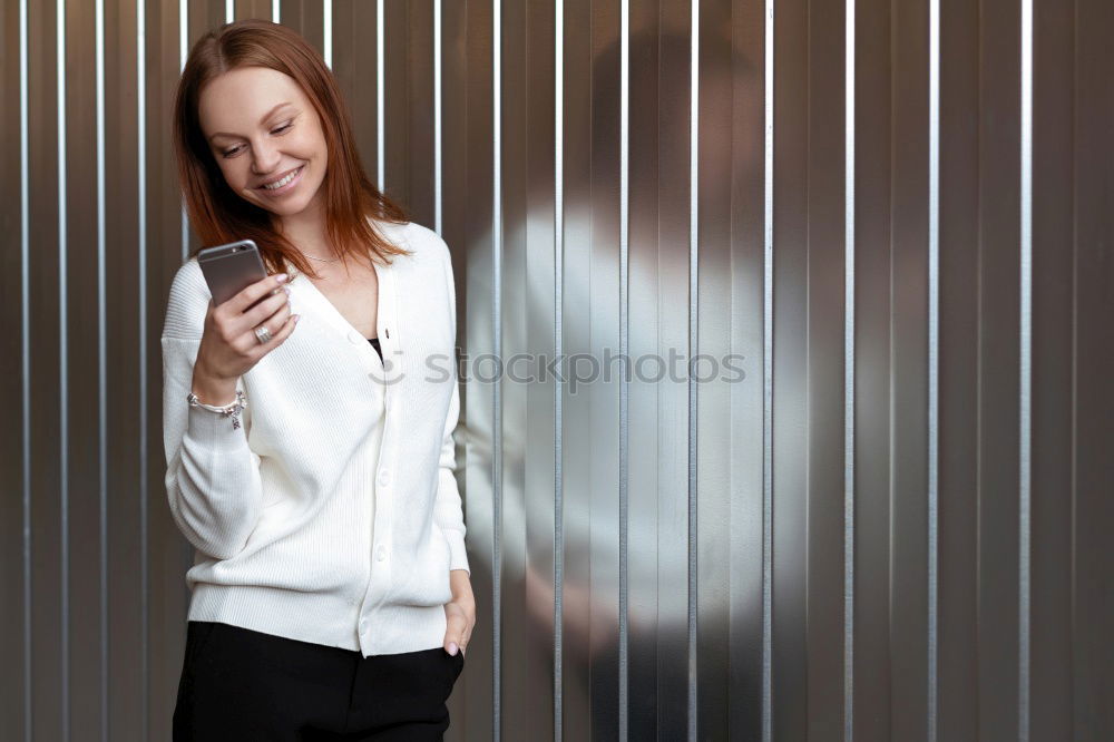 Similar – Woman in armchair using laptop and drinking coffee