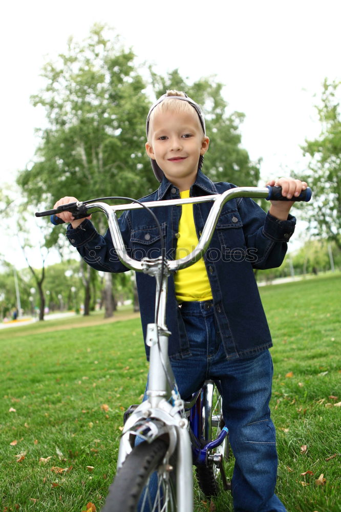 Similar – Five year old child with scooter in the park