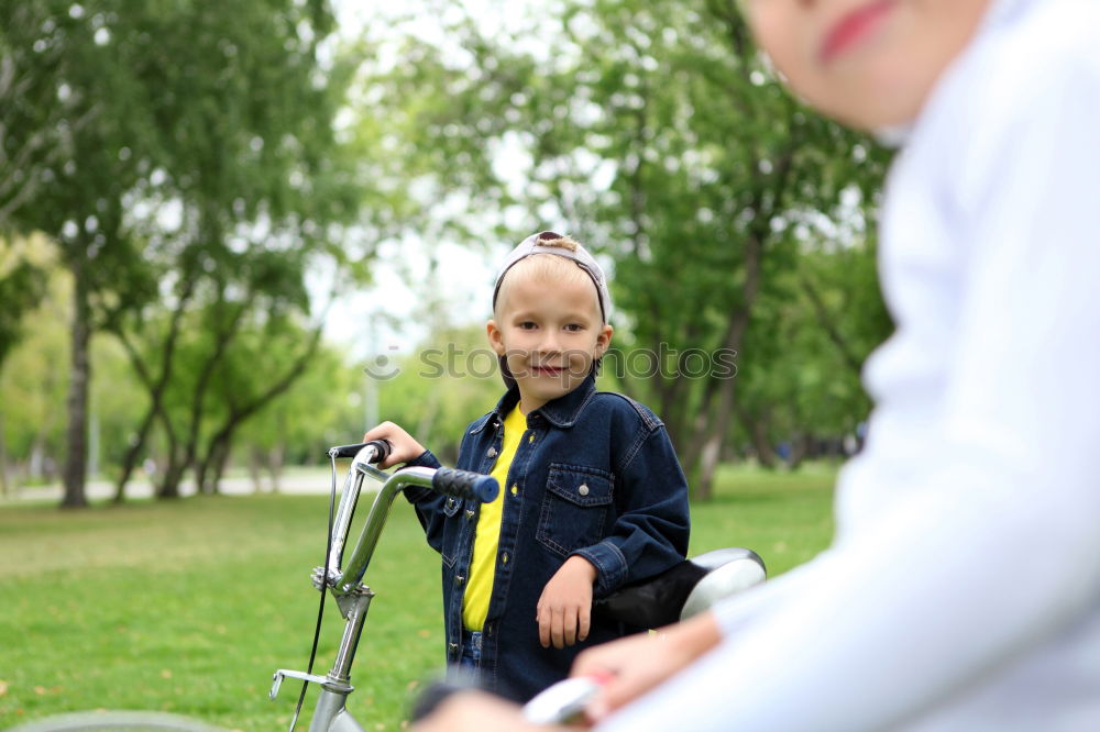 Similar – Child with smartphone taking a picture of baby