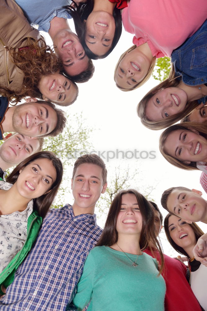 Similar – Group of young people together outdoors in urban park.