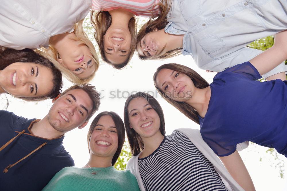 Similar – Group of young people together outdoors in urban park.