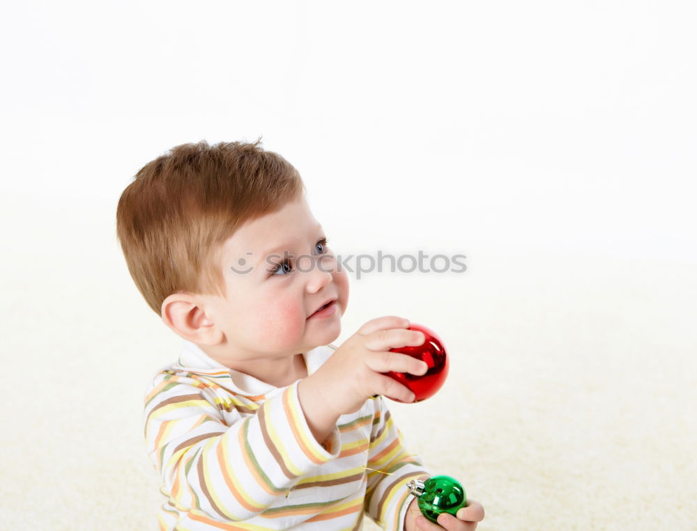 Similar – Child nibbles raspberries from his fingers