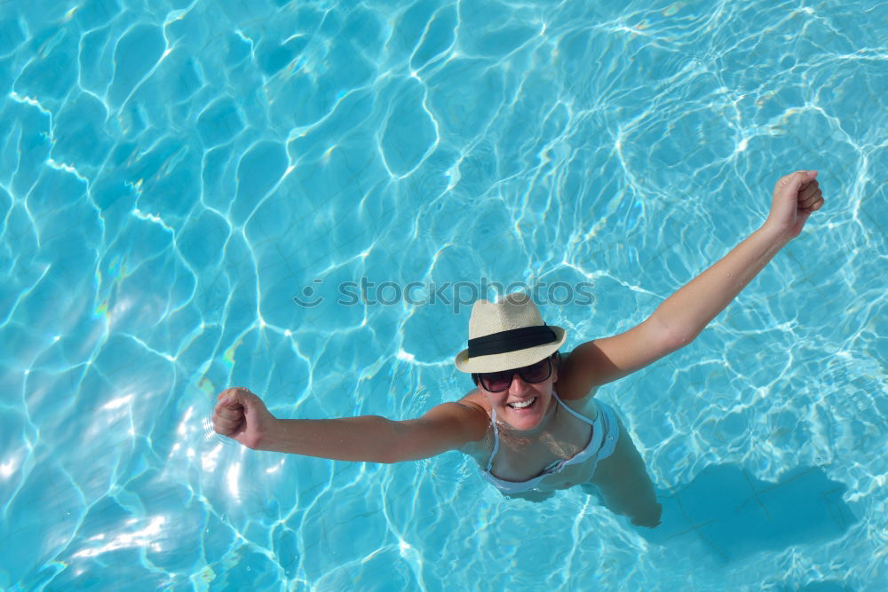 Similar – Girl with dress in pool