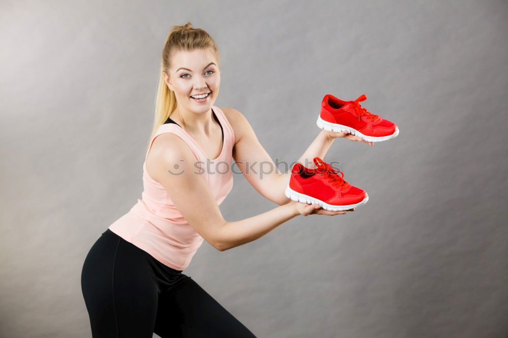 Similar – Woman stretching her body in front of ancient wall in park