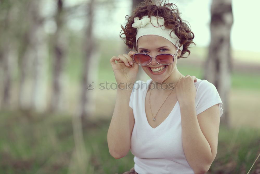 Similar – Image, Stock Photo Young woman lying down over rocks