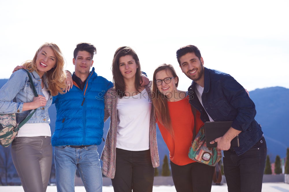 Similar – Image, Stock Photo Group of young people together outdoors in urban background.