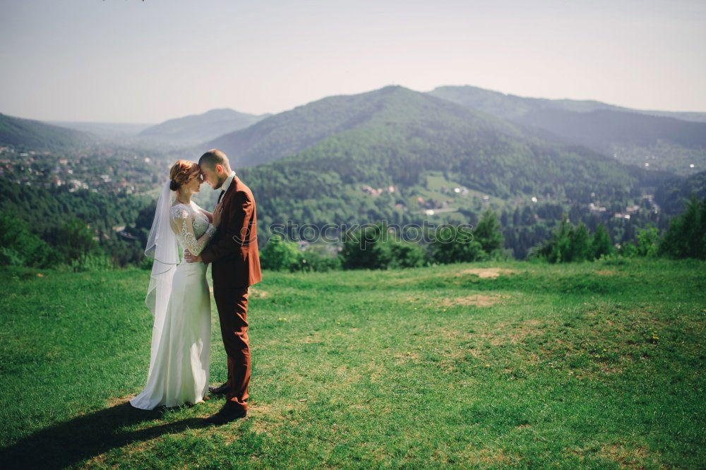 Similar – Two happy lovers on Holiday in the alps mountains