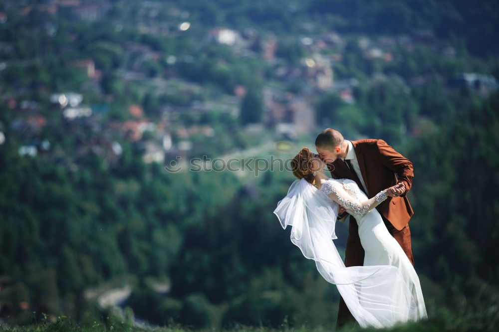 Similar – Two happy lovers on Holiday in the alps mountains