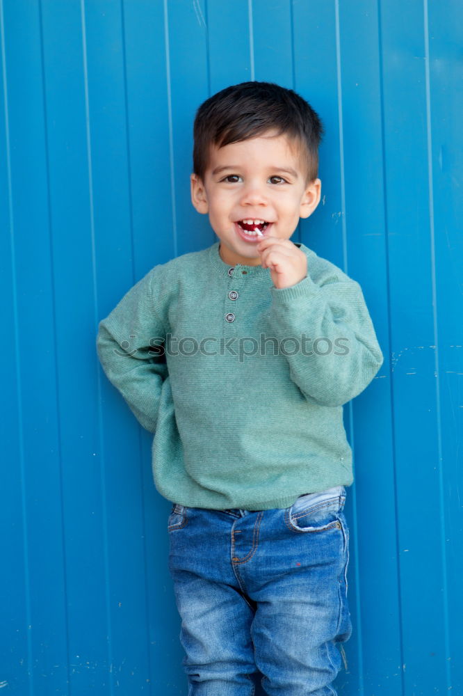 Similar – Portrait of a cute little boy on a village of an island greek