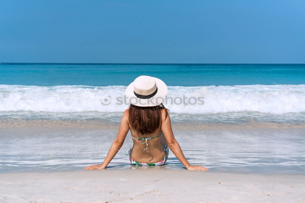 Similar – Surfer girl on the white sand beach