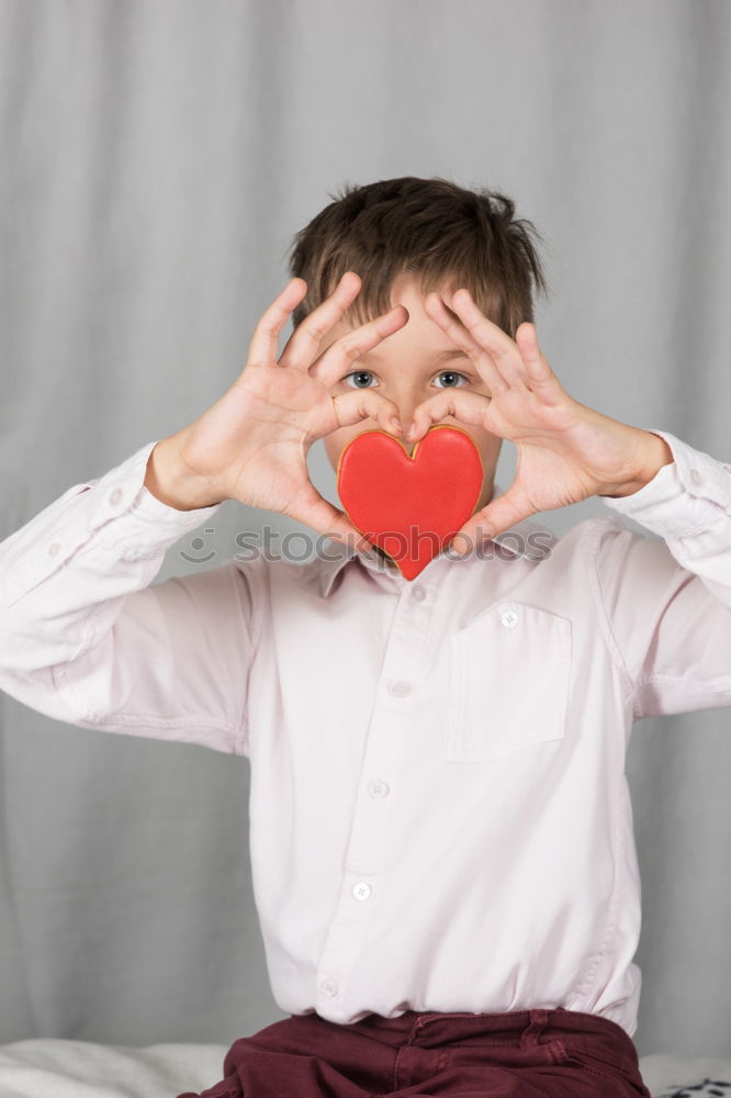 Similar – Image, Stock Photo Boy with chalk doesn’t want hate but love