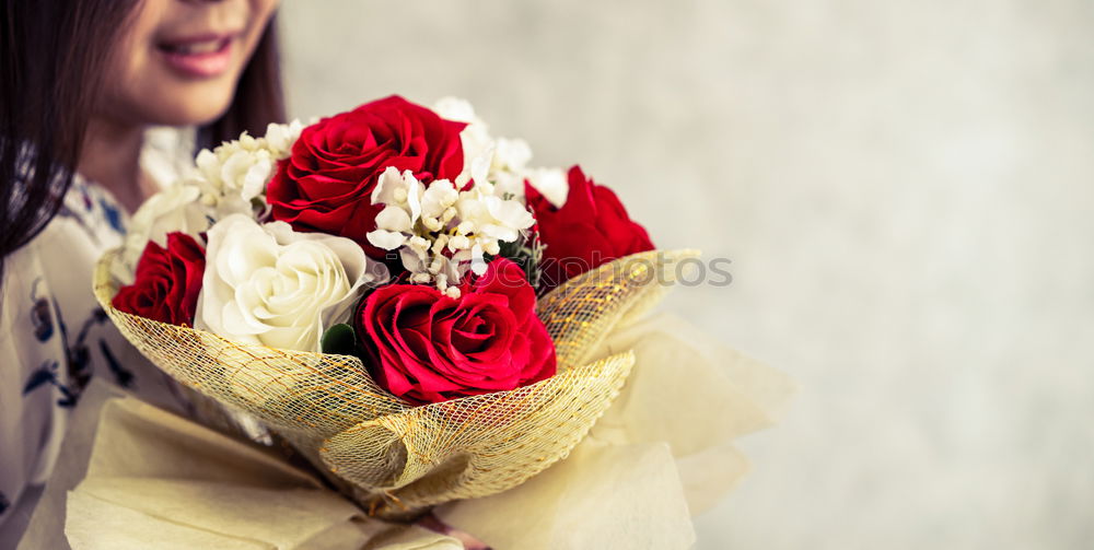 Similar – Image, Stock Photo young woman holding bouquet of red roses in her hands, valentines day, mother’s day, gift