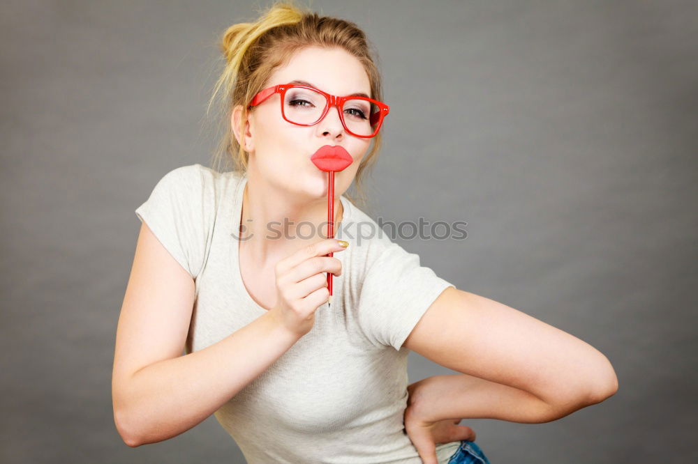 Similar – Image, Stock Photo Young woman bites an apple