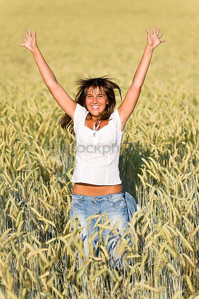 Similar – Black woman with afro hair celebrating with confetti.