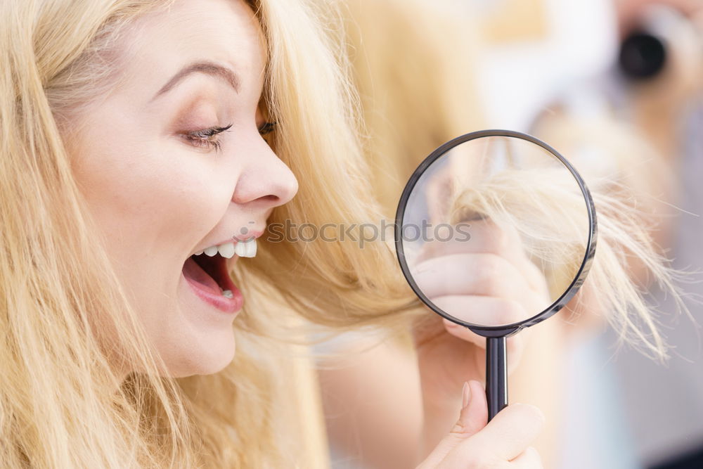 Similar – Image, Stock Photo Young woman looking at herself in a mirror