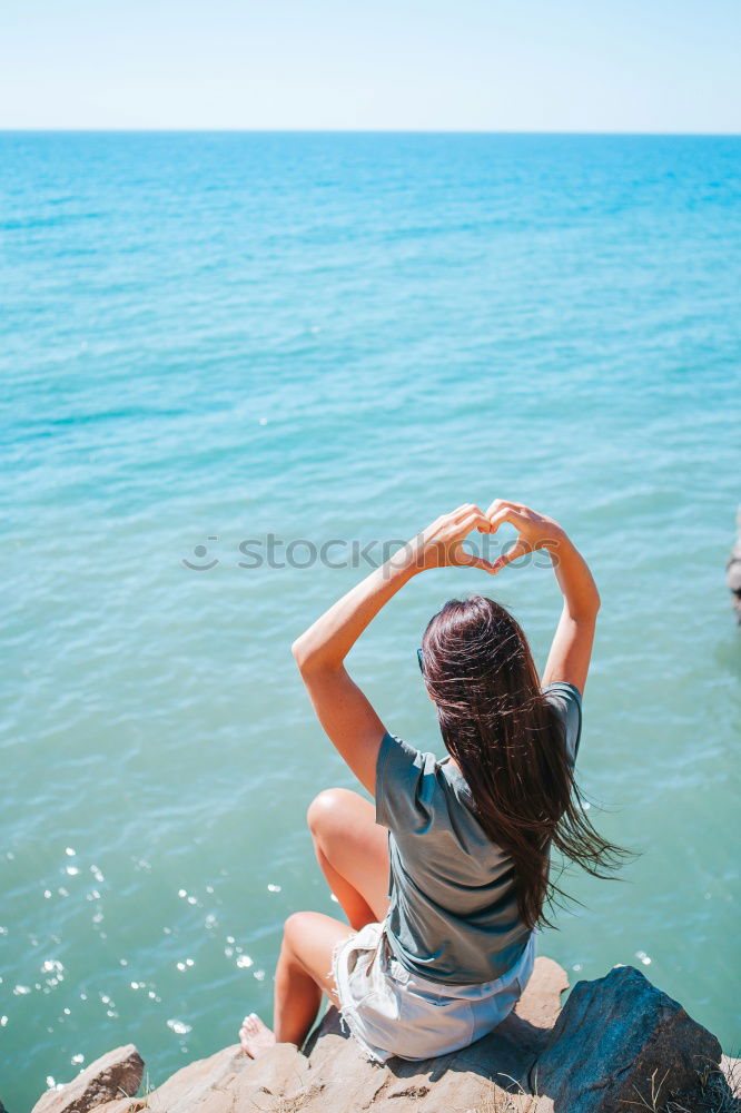 Similar – Image, Stock Photo Smiling woman offering to follow her near sea