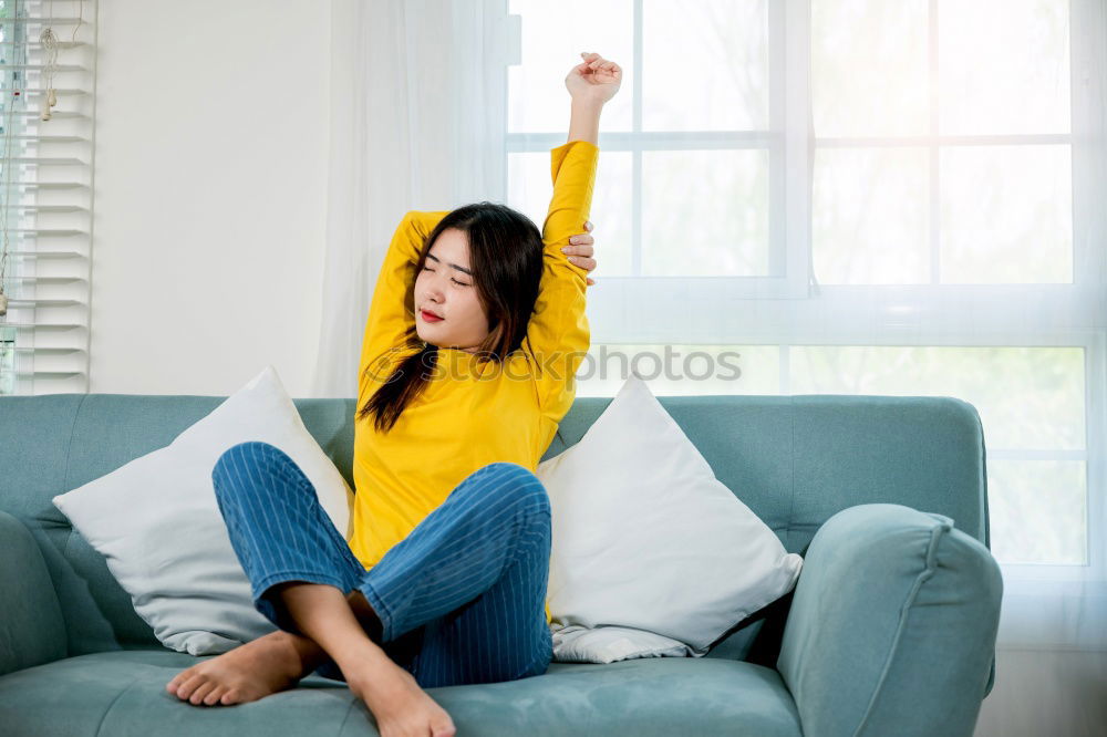 Similar – Image, Stock Photo Young woman sitting and resting on bed
