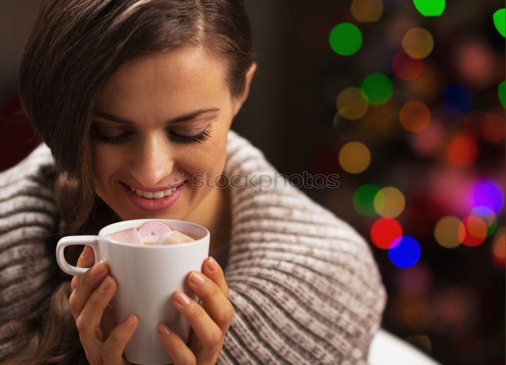 Similar – Young woman holding warm cup of tea