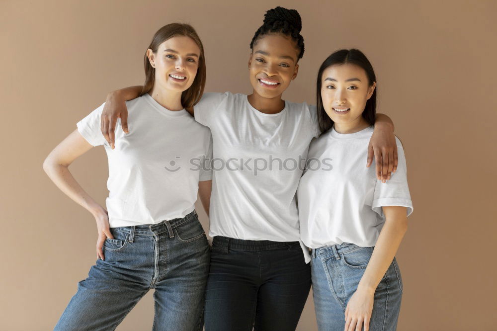 Similar – Cheerful multiracial women friends posing