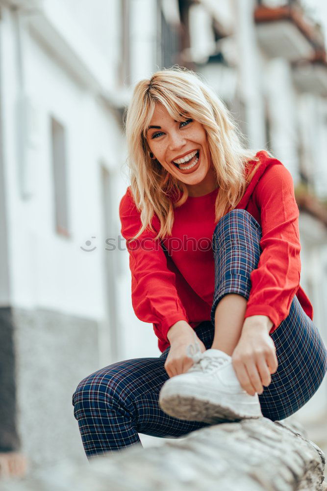 Similar – Image, Stock Photo Happy young blond woman standing on urban background.