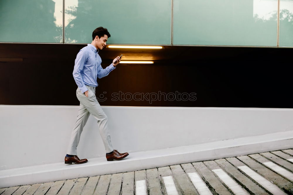 Similar – Image, Stock Photo Young man wearing winter clothes standing in the street