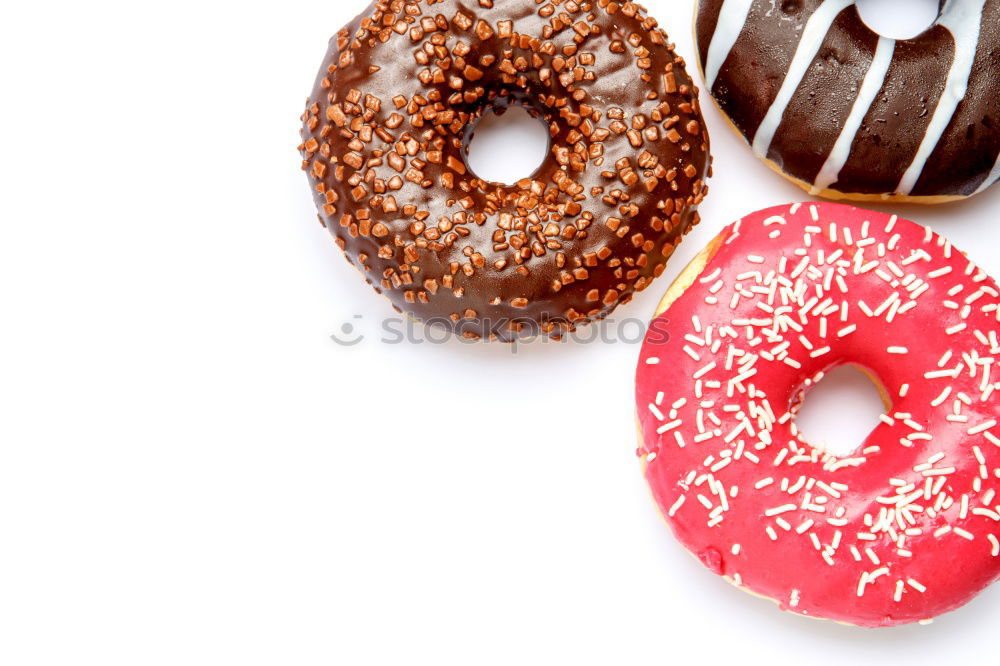 Similar – Freshly baked donuts with glaze