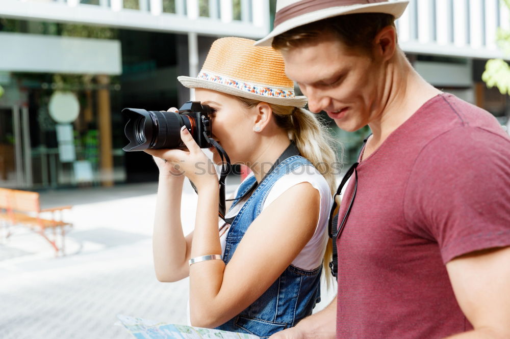 Similar – Image, Stock Photo Young couple taking selfies