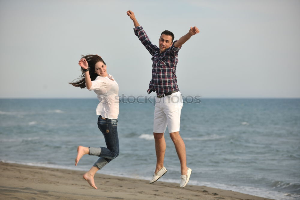 Similar – Father and son playing on the beach at the day time.