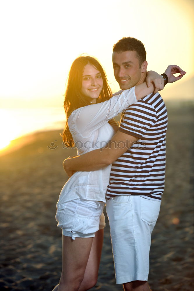 Similar – Image, Stock Photo Couple taking selfie photo in smartphone with sea and dark cloudy sky on background