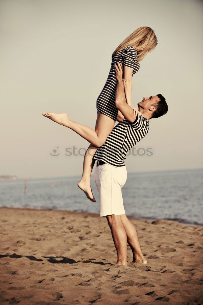 Image, Stock Photo Fitness couple kissing on the beach