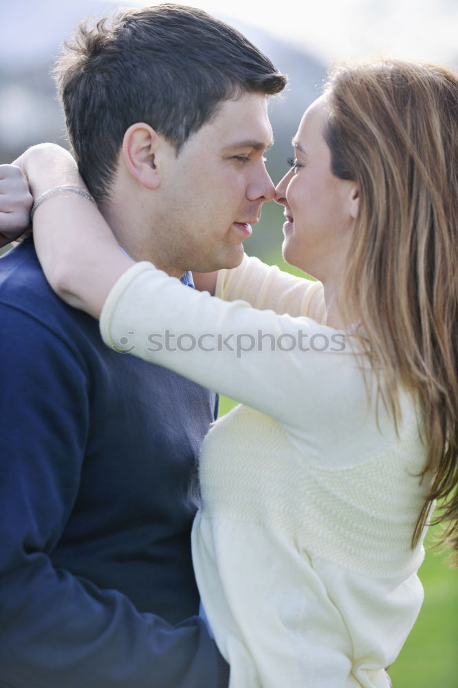 Similar – Young couple kissing through of glass car